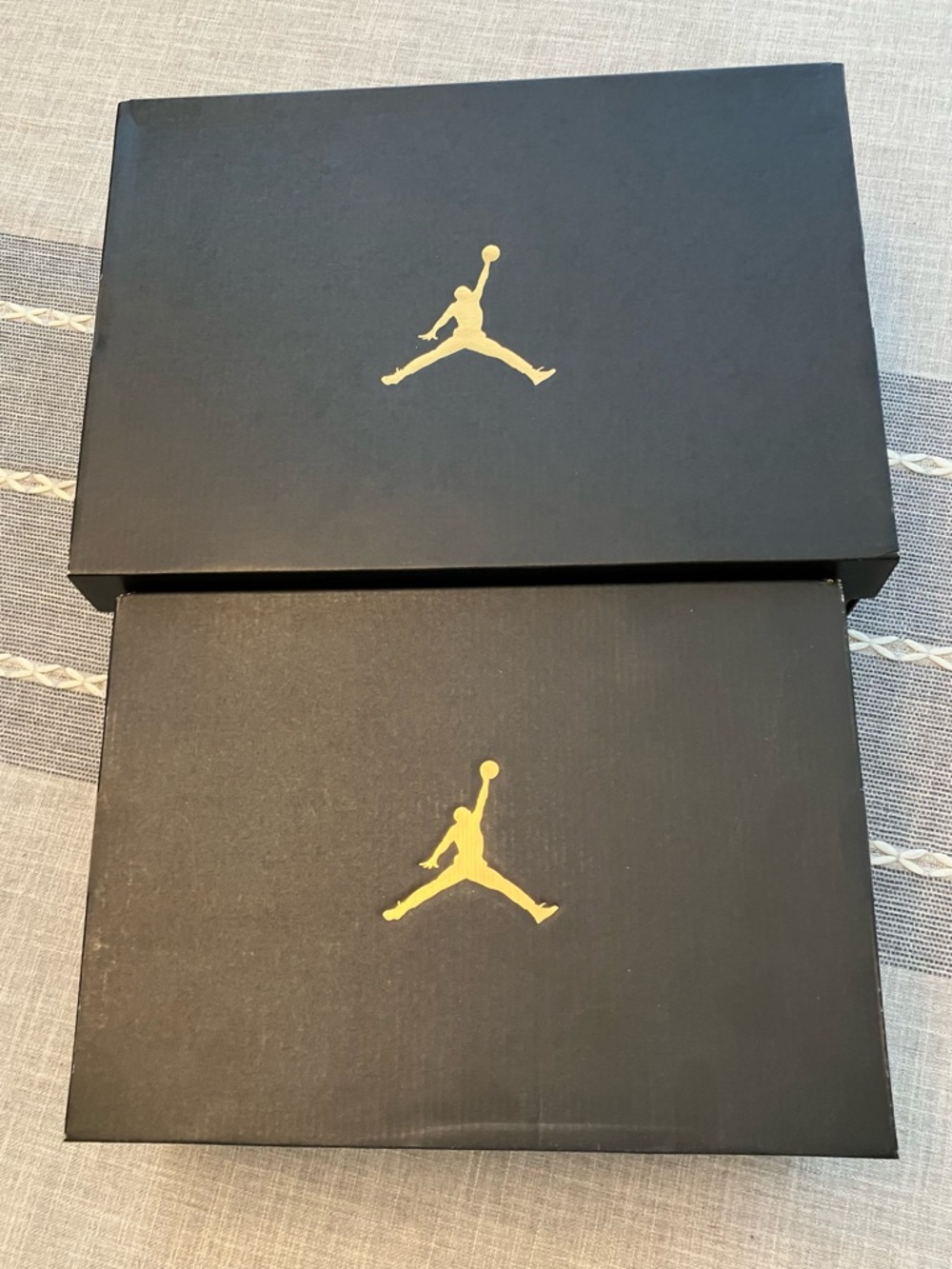 2 Nike Air Jordan shoe boxes, black with gold Jumpman logo (fits men’s 8.5 & 10)